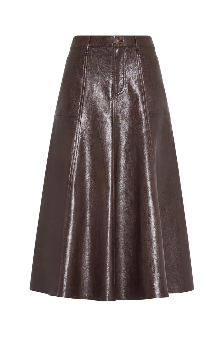 Elongated vegan leather skirt, shiny finish, front zipper, structured waistband, front view on white.