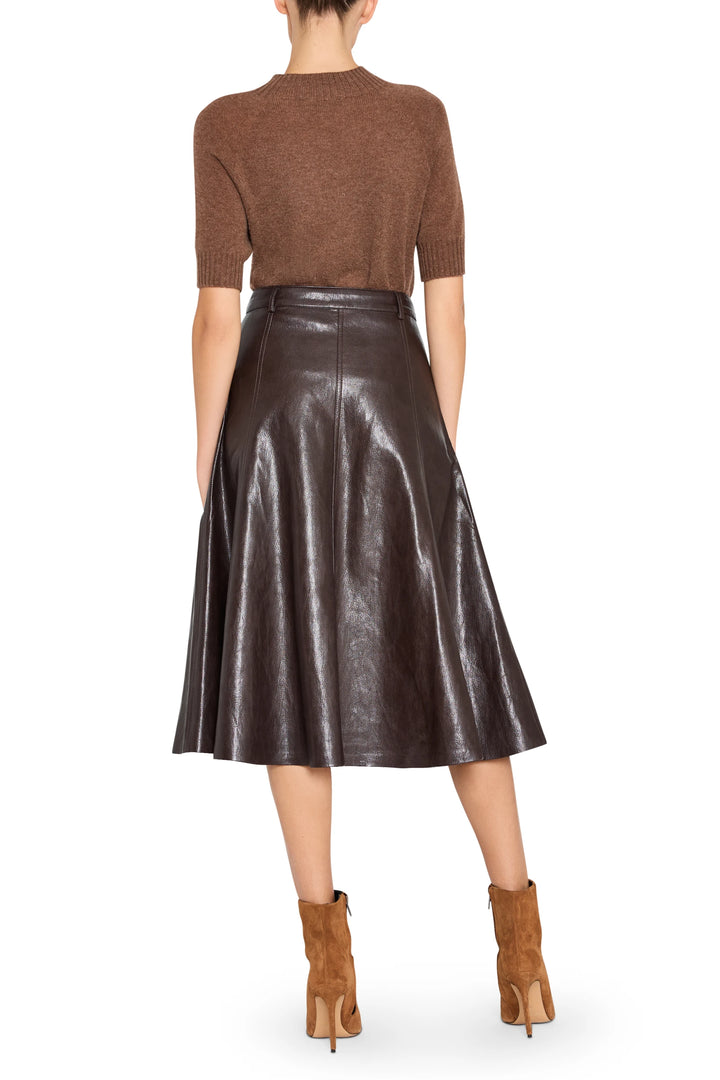 Ellen Vegan Leather Skirt, midi silhouette with clean lines and structured shape, back view on model.