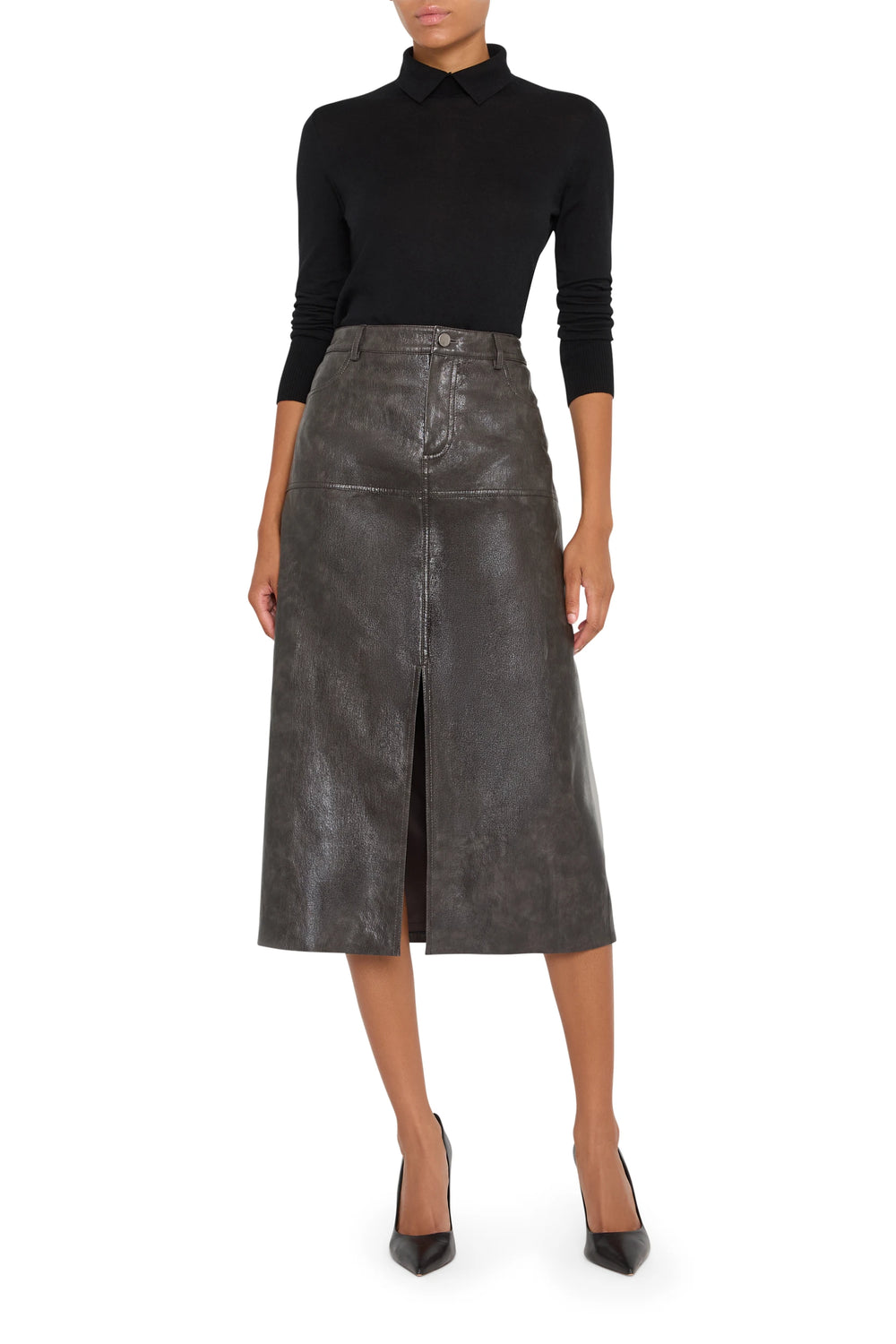 Fitted vegan leather pencil skirt with front slit and clean waistband, knee length, front view on model.