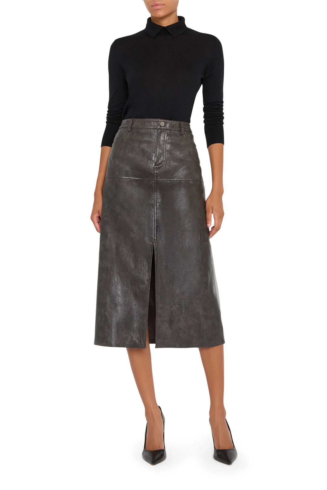 Fitted vegan leather pencil skirt with front slit and clean waistband, knee length, front view on model.