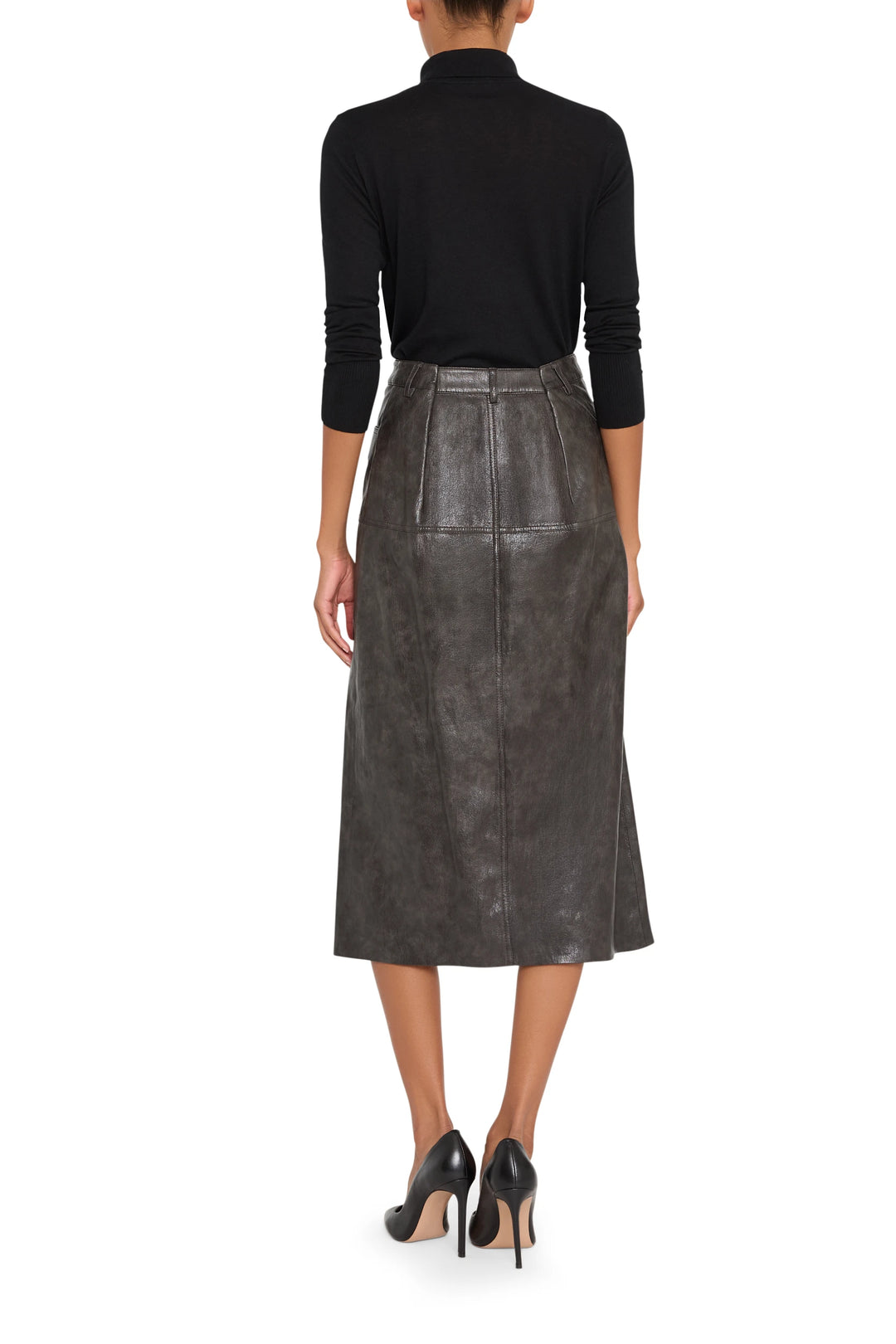 Vegan leather pencil skirt with slim silhouette and clean seaming, back view on model.