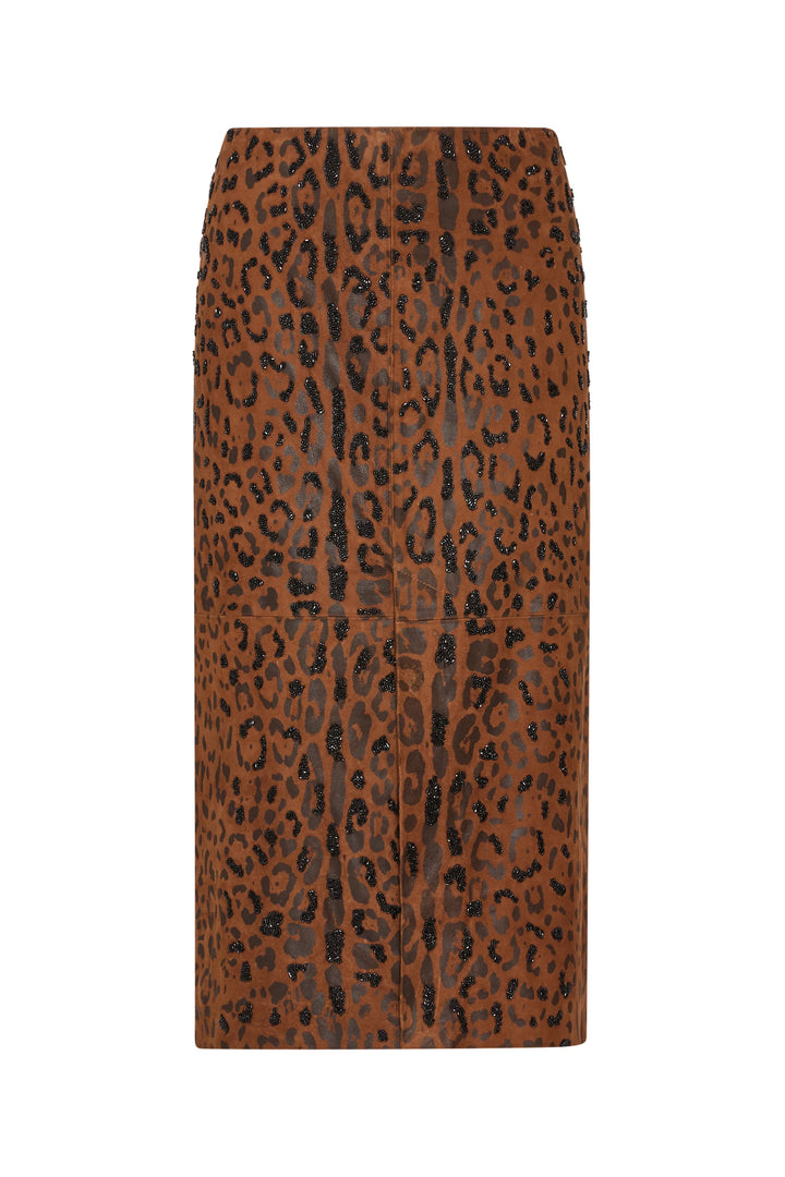 Brown knee-length pencil skirt in suede with black leopard print, paneled construction; front view on white.
