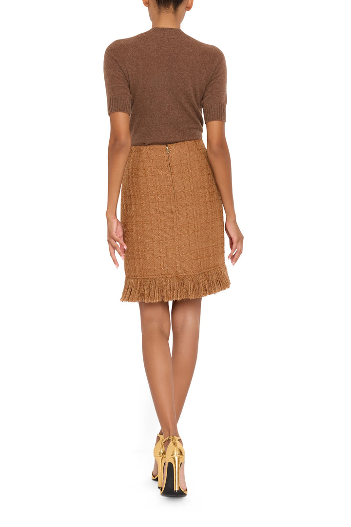Marisa Tweed Skirt with straight silhouette and classic tweed fabric; back view on model.