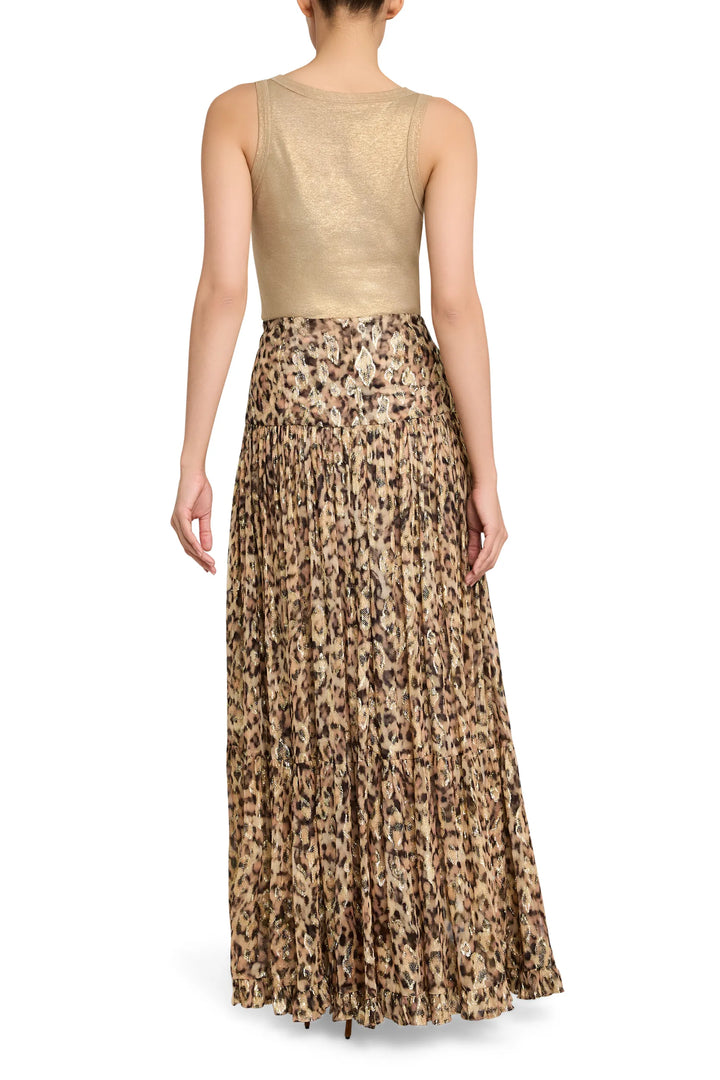 Shona Long Lurex Skirt, draped silhouette with metallic thread accents, maxi length; back view on model.