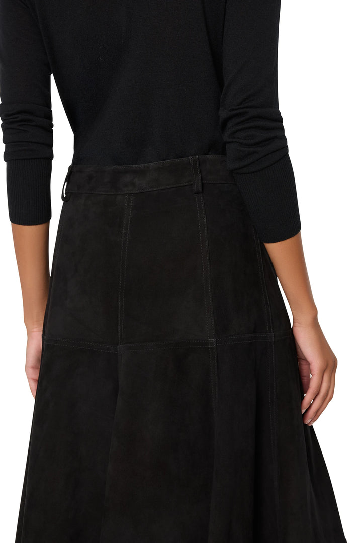Suede skirt with straight silhouette and clean waistband, minimal detailing; back view on model.