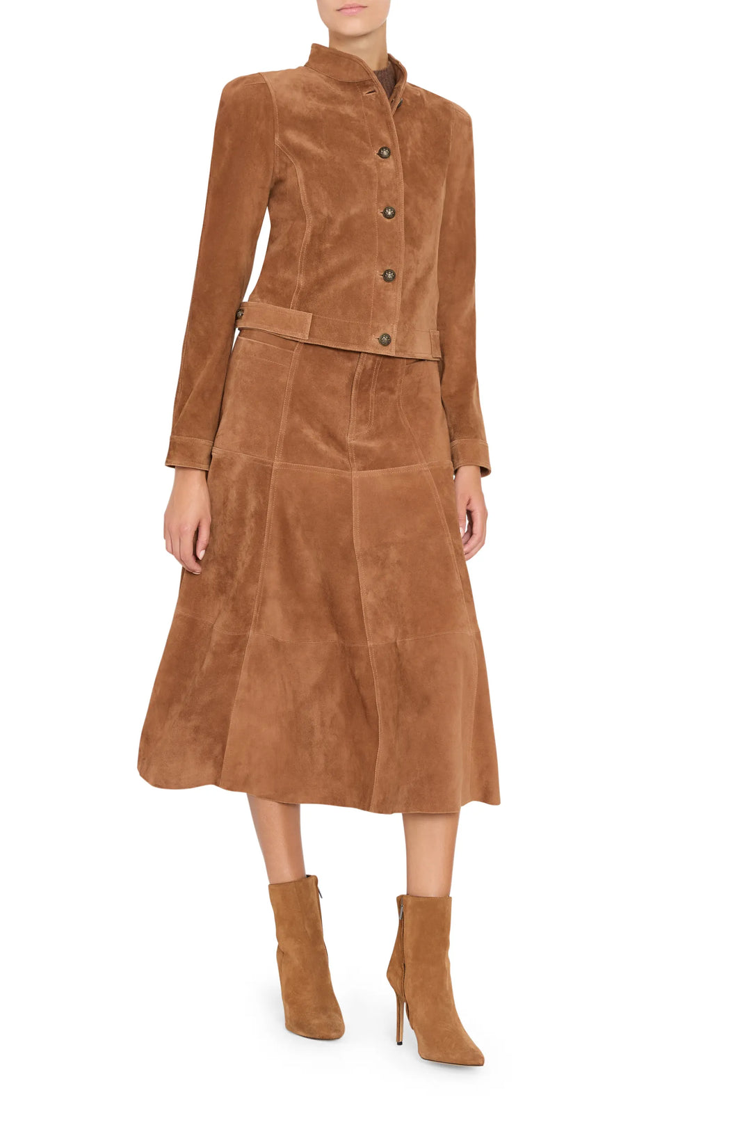 Suede skirt with clean lines and structured silhouette, midi length, subtle seaming; front view on white.