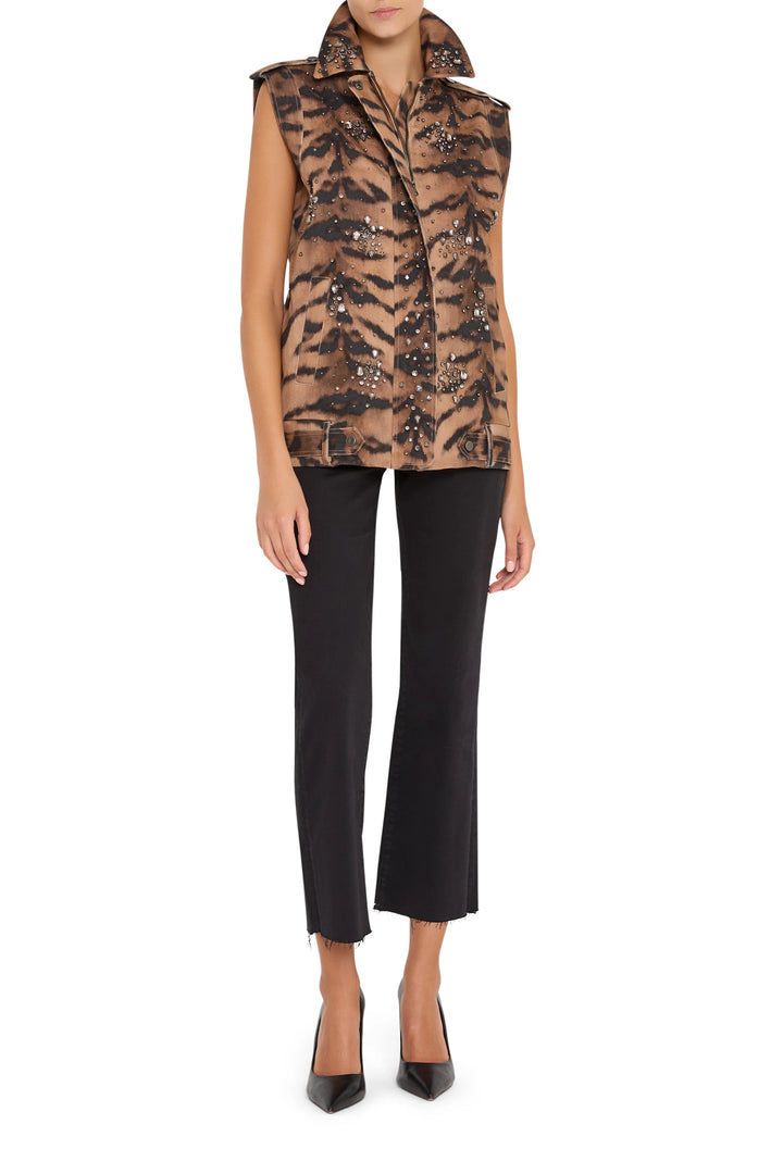 Sleeveless vest with animal print, straight silhouette, embellished details; front view on model.
