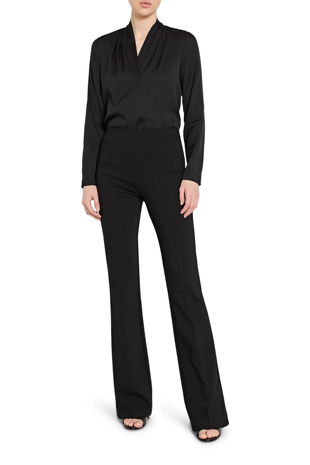 Black long-sleeve top and pants set on a white background