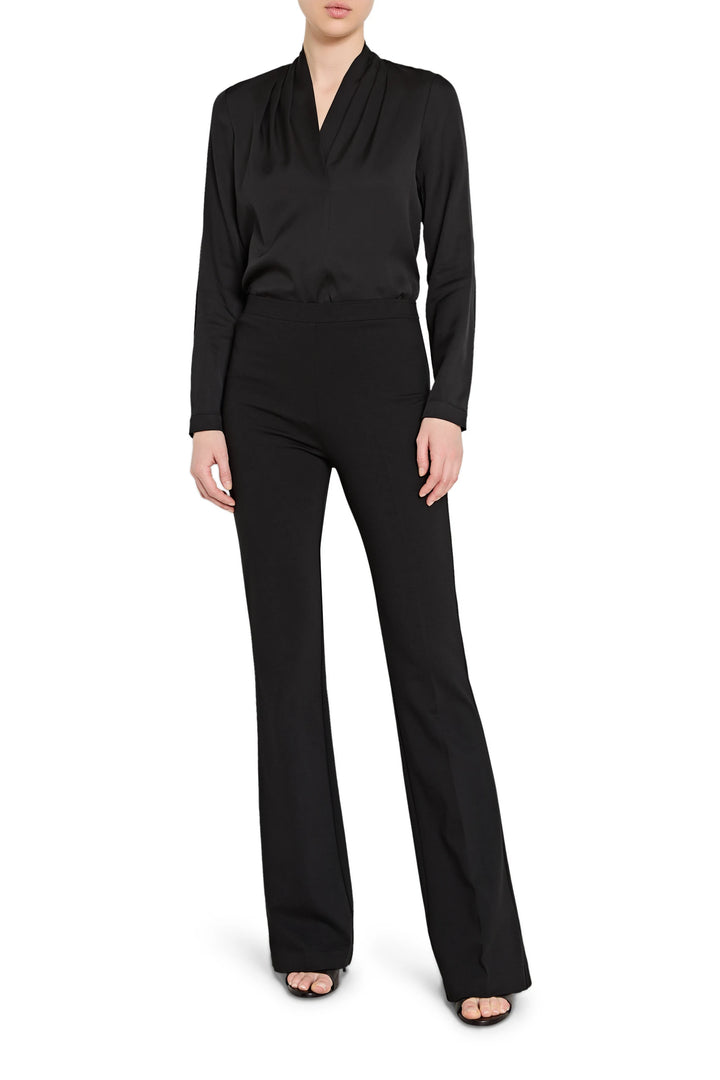 Black long-sleeve top and pants set on a white background