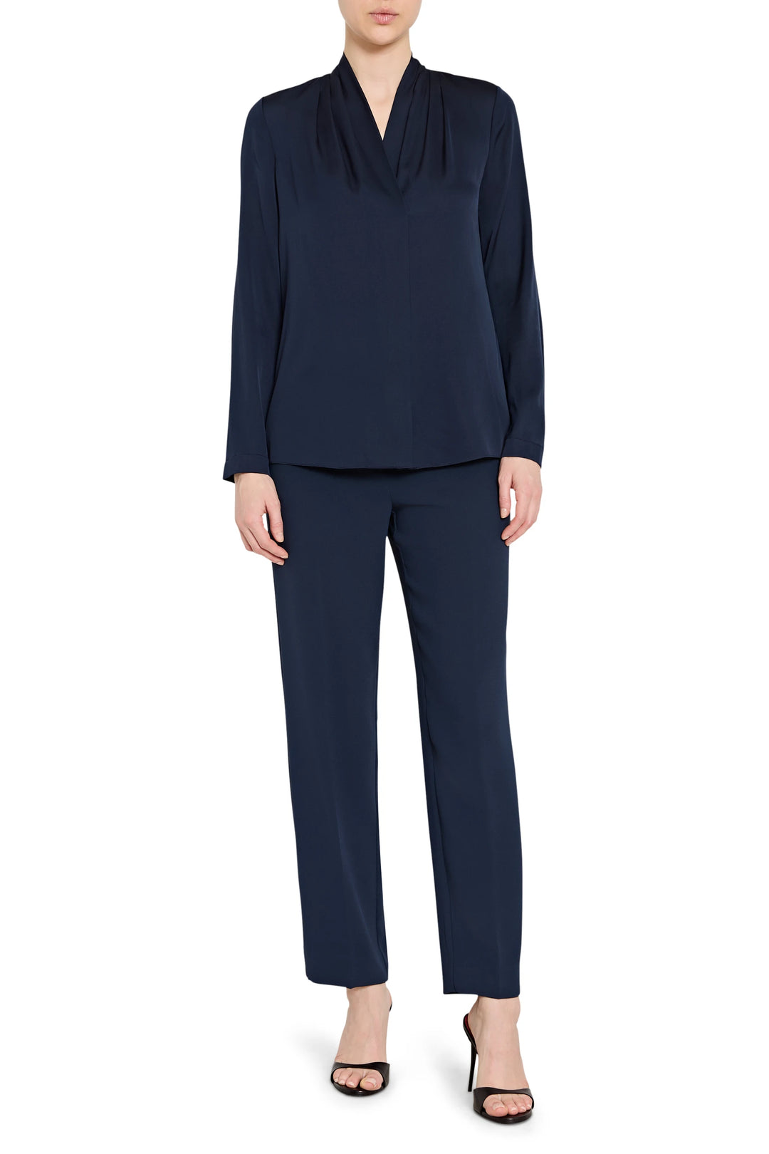 Navy blue outfit with a top and pants on a white background