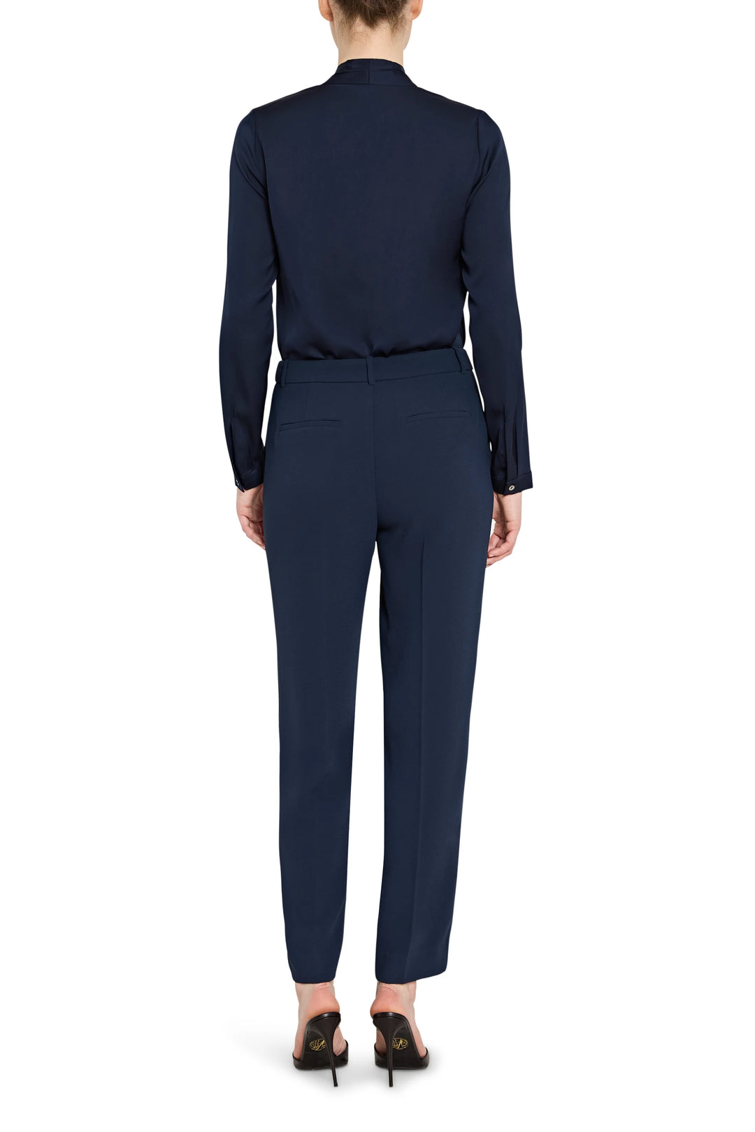 Navy blue suit with a blouse and pants on a white background