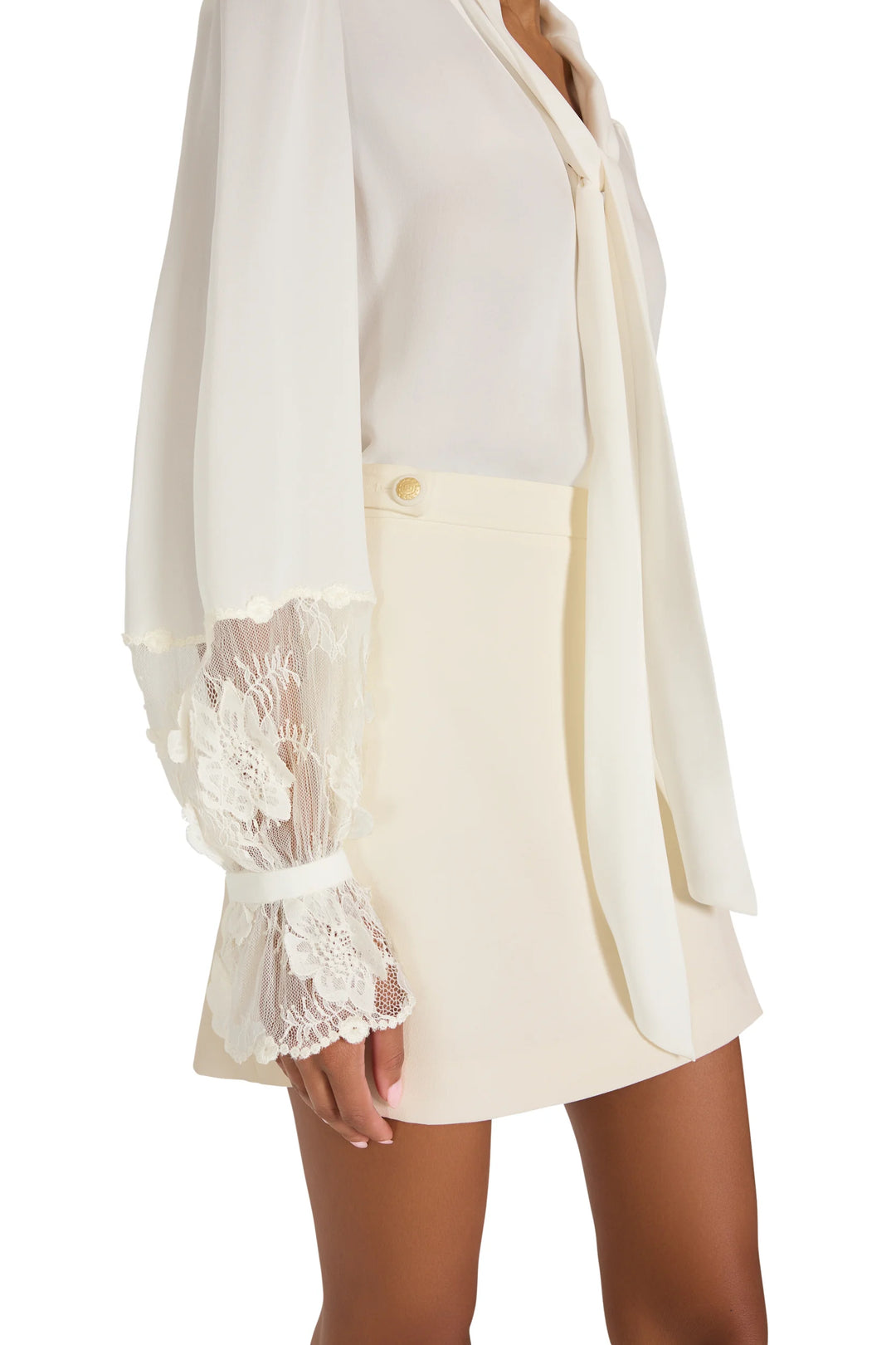 Jaxx Lace Detail Blouse in silk georgette with tie-neck and Chantilly lace-trimmed cuffs, side view on model.