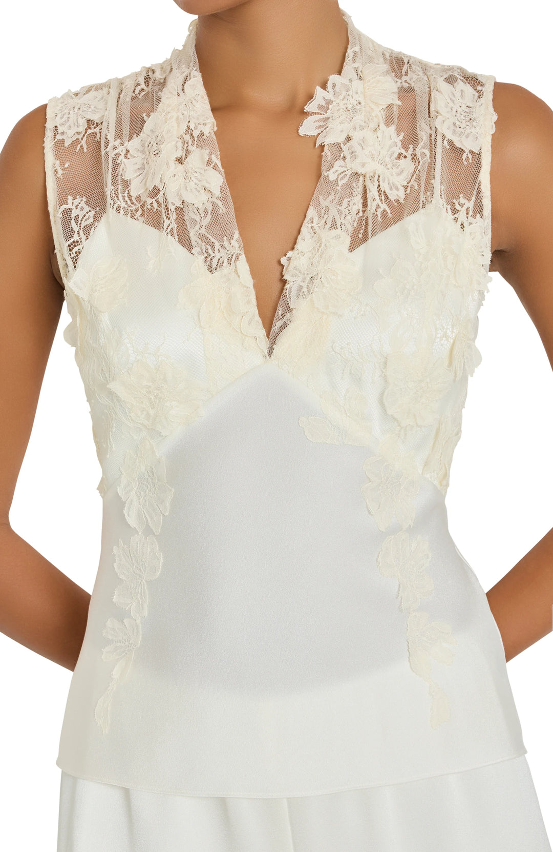 Renana Lace Detail Blouse, a sleeveless V-neck top with floral Chantilly lace panels, front view on model.