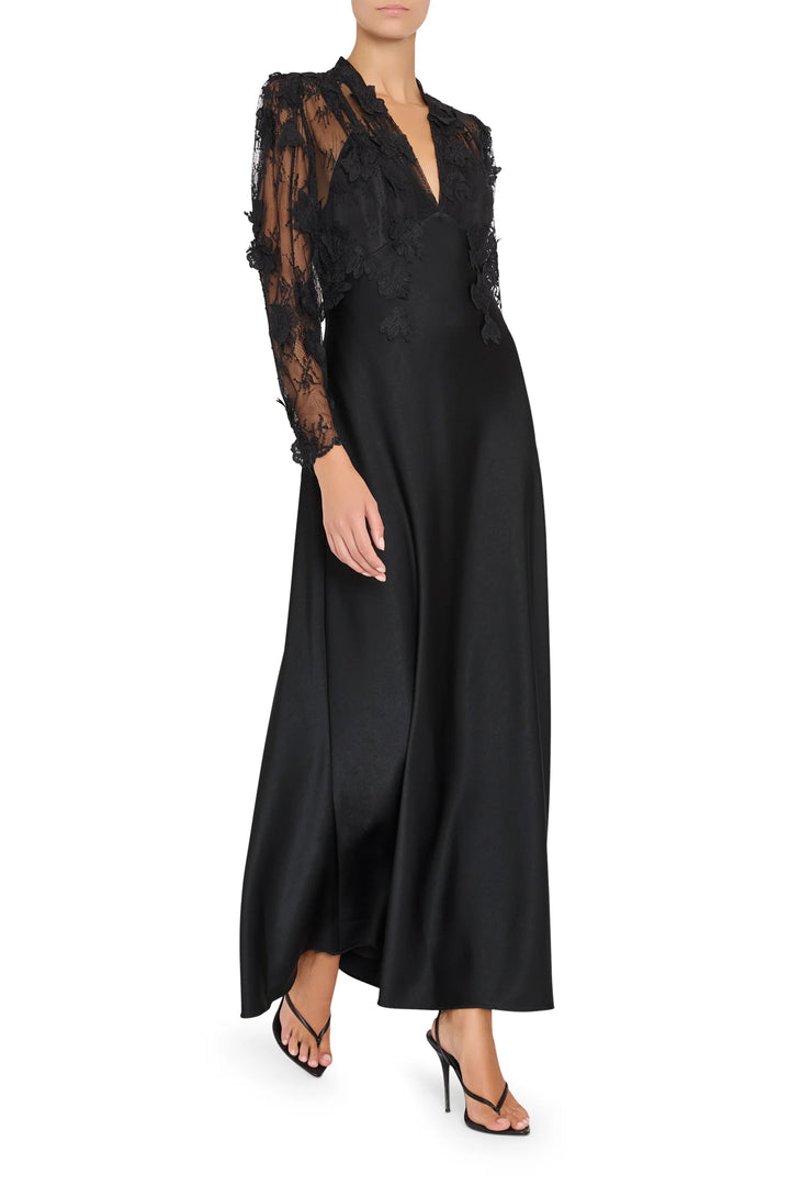 Kyan Long Dress: floor-length satin back crepe gown, sheer Chantilly lace sleeves, V-neck bodice, front view on white.