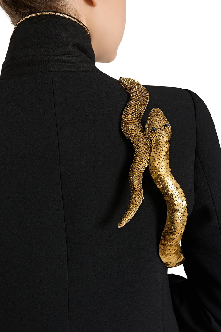 Black coat with gold snake design on the back