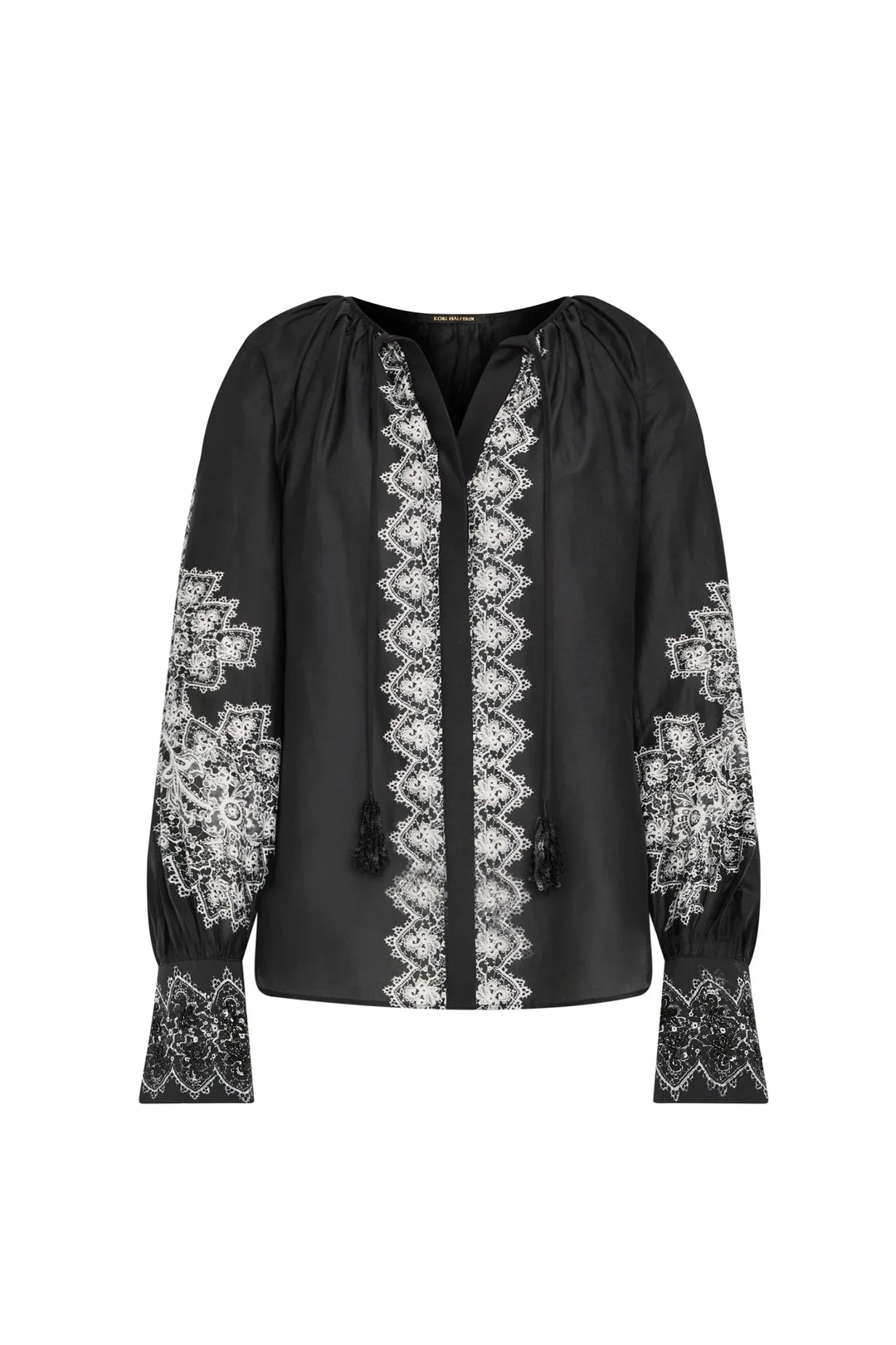 Silk cotton blouse with V-neck, handmade embroidery, tassel ties, detailed sleeves and cuffs; front view on white.
