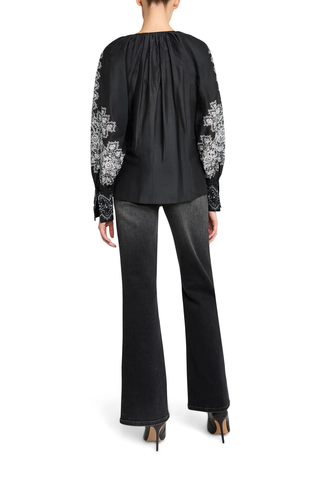 Relaxed-fit embroidered blouse with voluminous sleeves, tonal stitching. Back view on model.