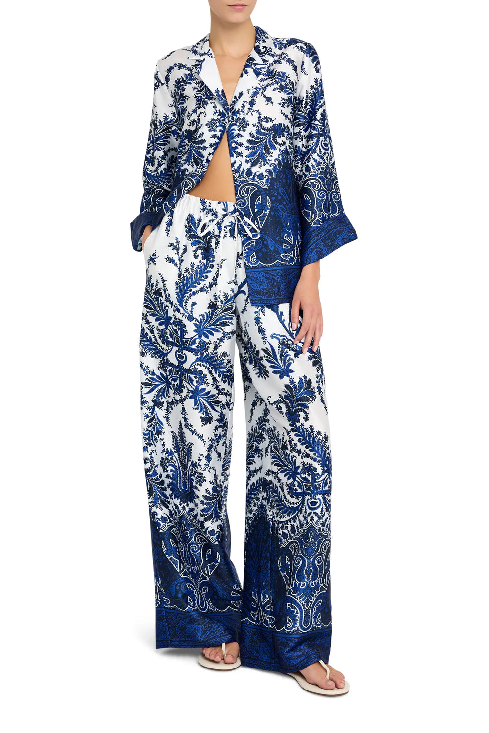 Relaxed-fit, long sleeve blouse with button front and classic collar in Naomi print; front view on model.