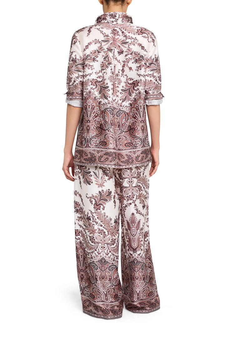 Relaxed silhouette blouse in printed twill with back yoke and soft drape, back view on model.
