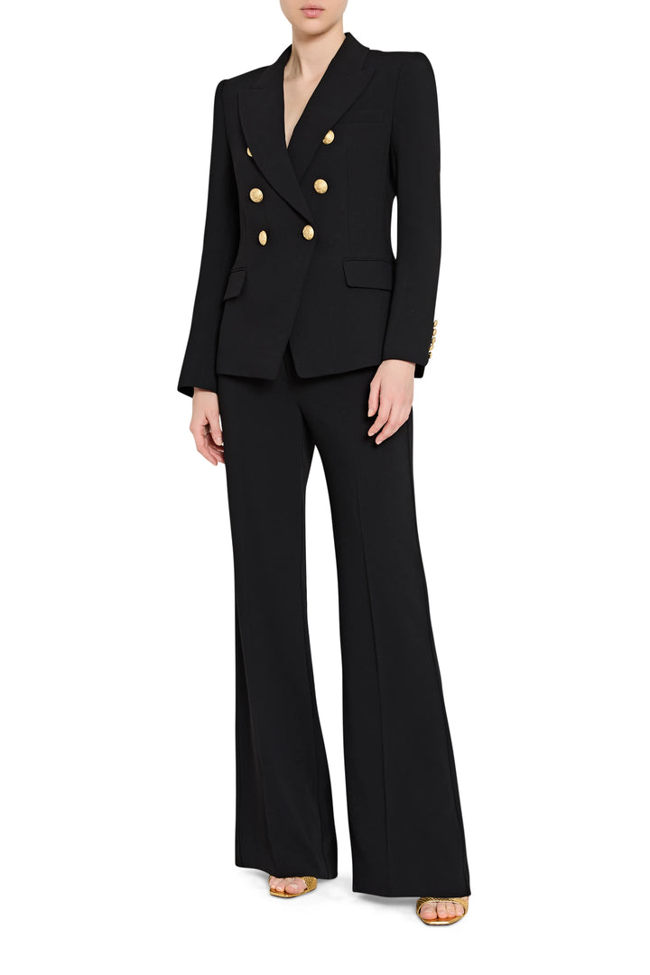 Black suit with gold buttons on a white background