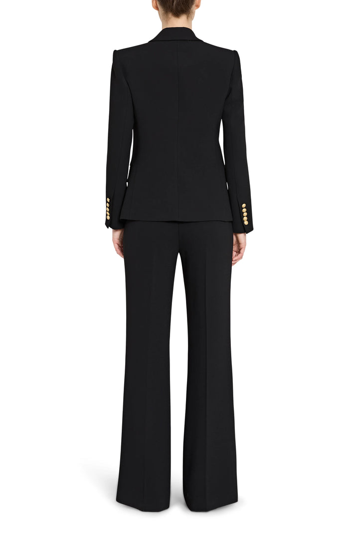 Black suit with gold buttons on a white background