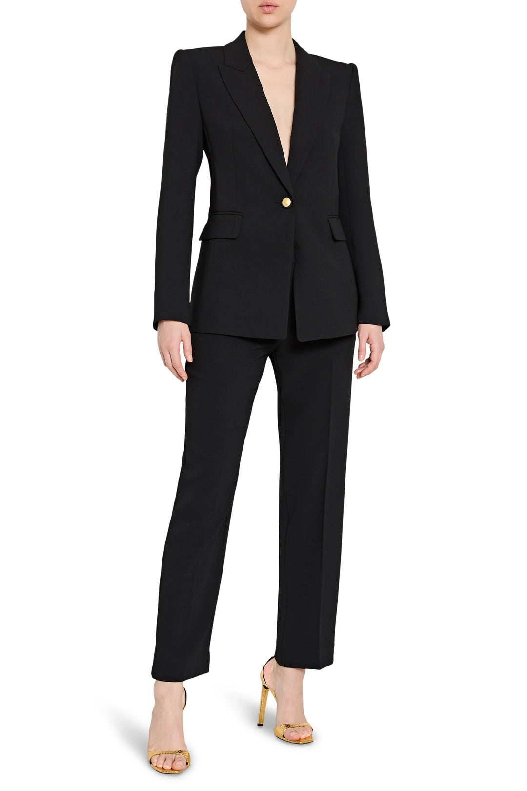 Black suit with a gold button on a white background