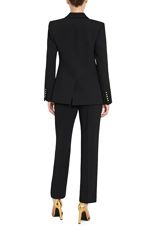 Black suit with gold buttons on a white background