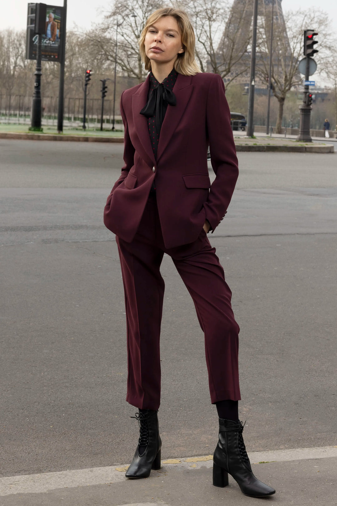 Slim ankle-length crepe pant with pull-on waistband and clean silhouette, front view on model.