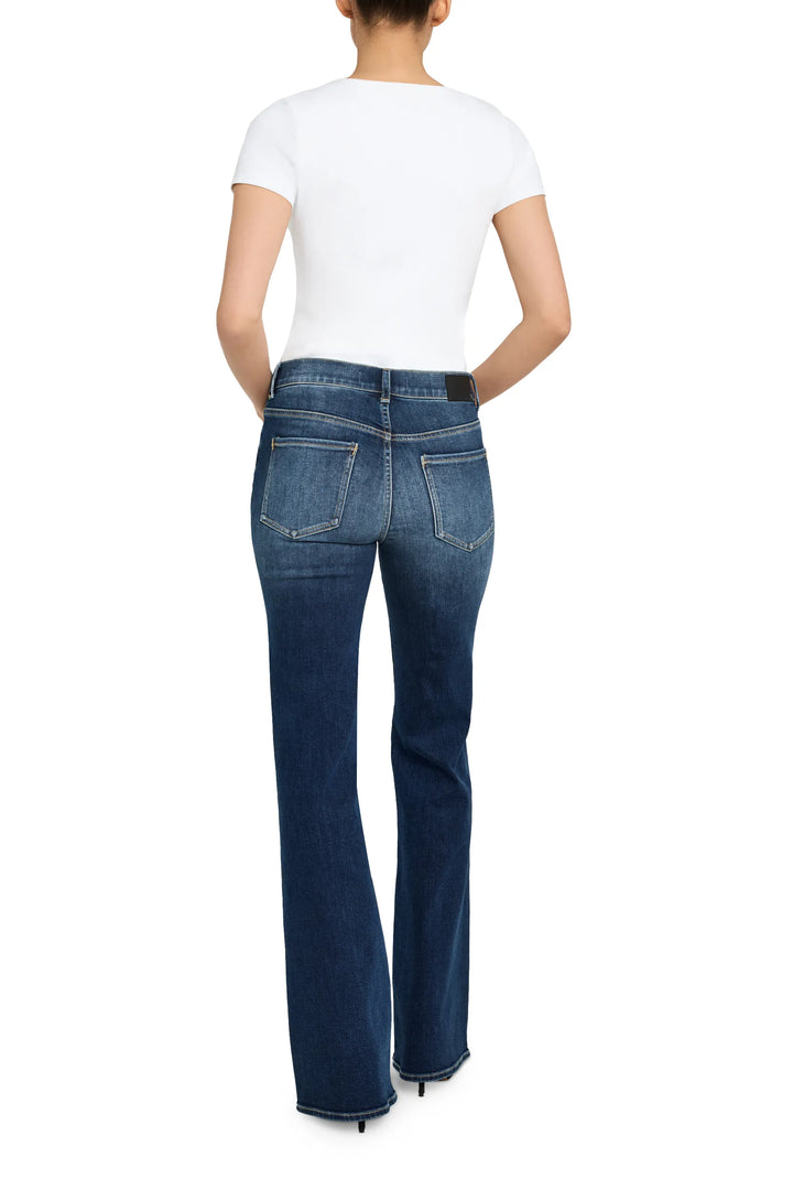 Rhianna Knit top with fitted silhouette, fine knit fabric, classic crewneck; back view on model.