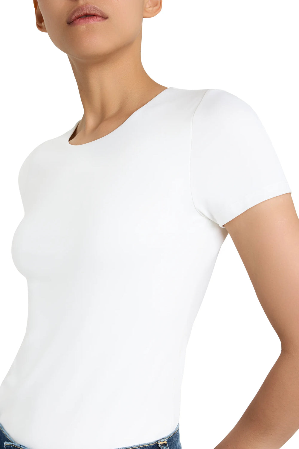 Fitted short-sleeve round neck cotton t-shirt with clean finish, straight hem; front view on model.