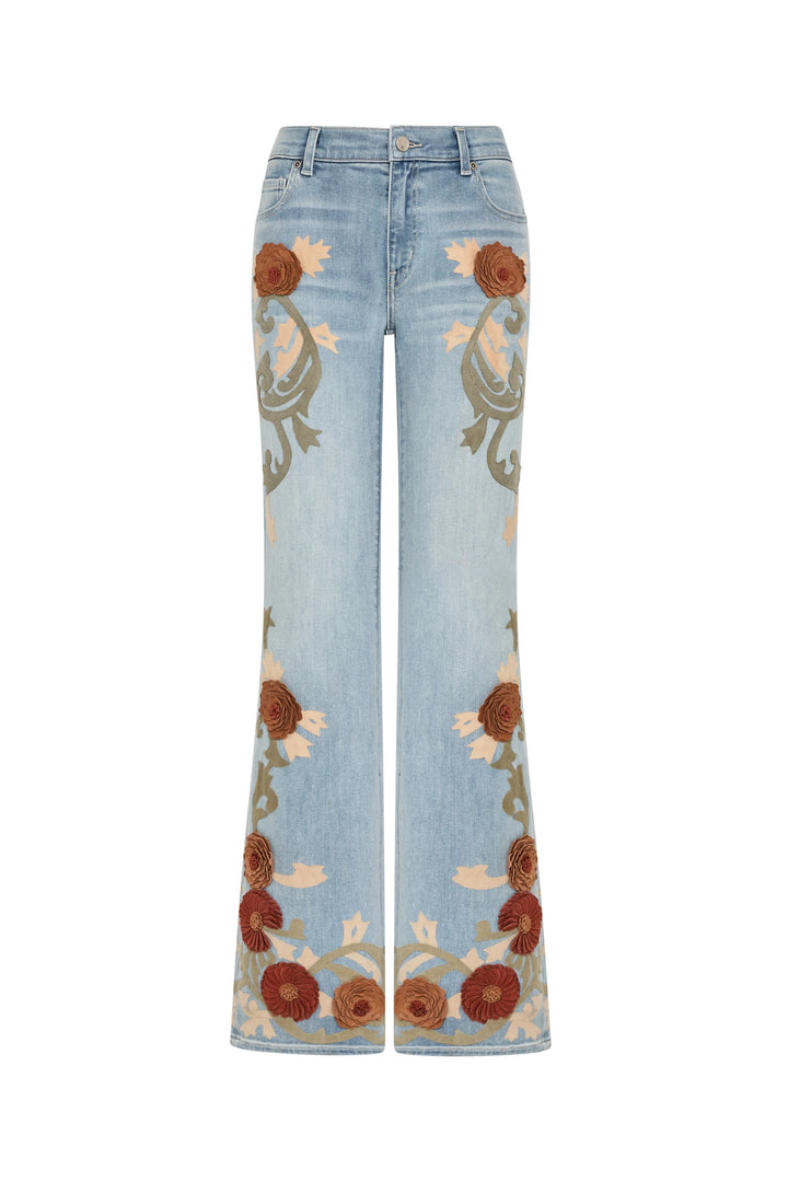 Low-rise wide-leg jeans in cotton denim with vintage wash and hand-embroidered floral appliqué, front view on white.
