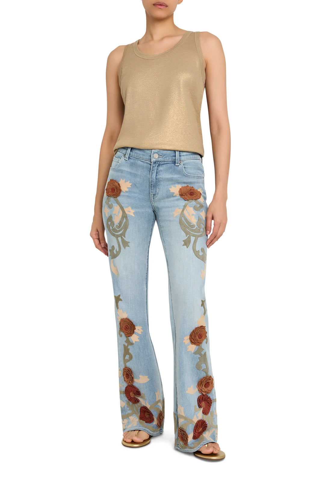 Straight-leg jean with appliqué embellishments, classic five-pocket construction, front view on white.