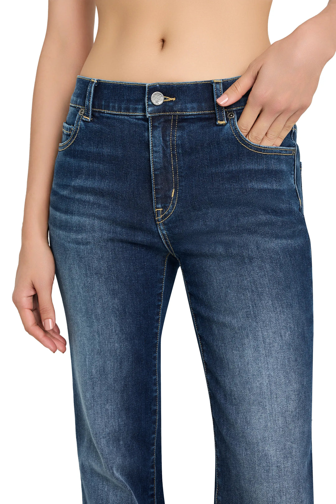 High-waisted, tailored Eden Jean with classic five-pocket construction and slim silhouette; front view on model.