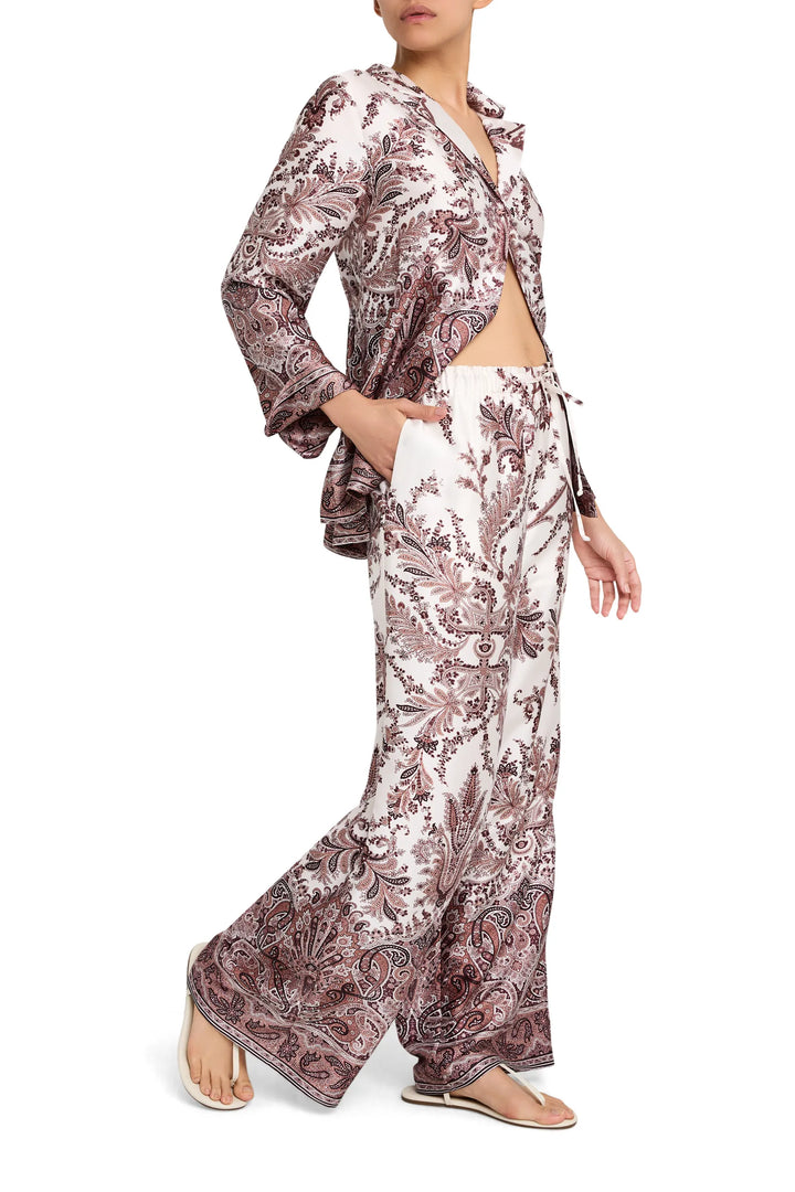 Wide-leg twill pants with relaxed fit and allover print, tailored waistband, concealed closure; front view on model.