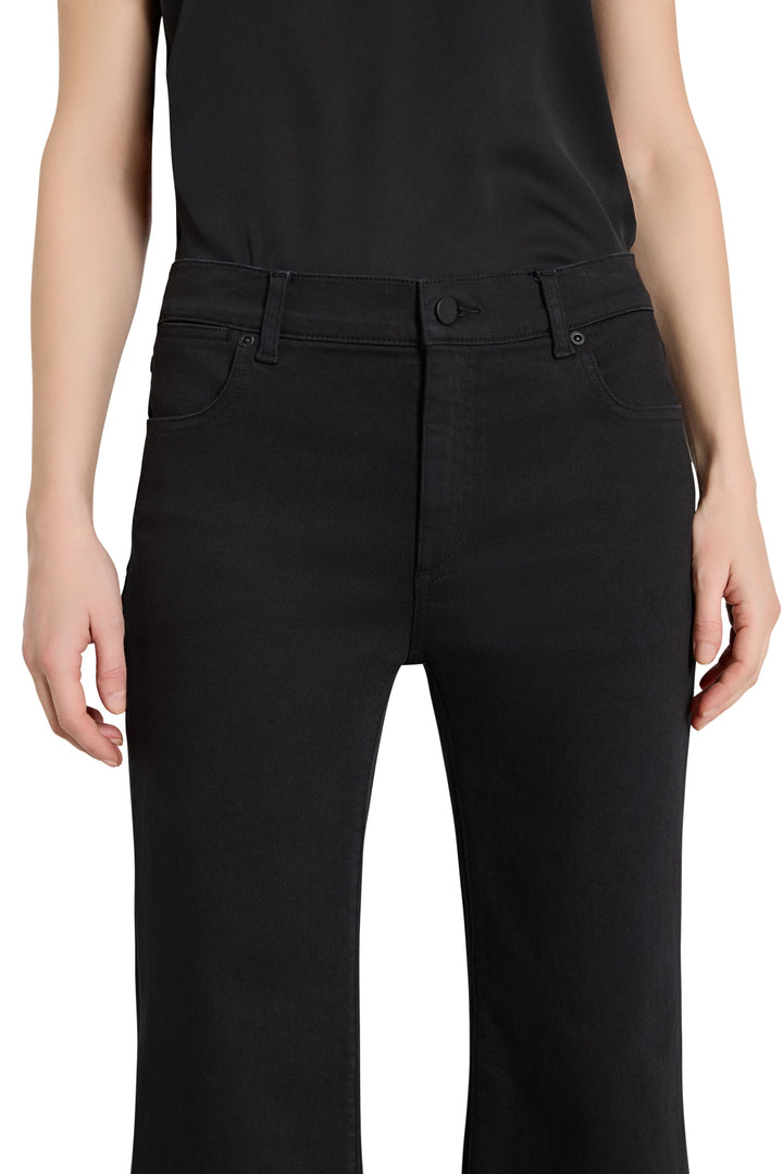 Person wearing black pants on a white background