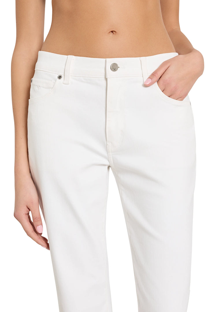White jeans worn by a person on a white background