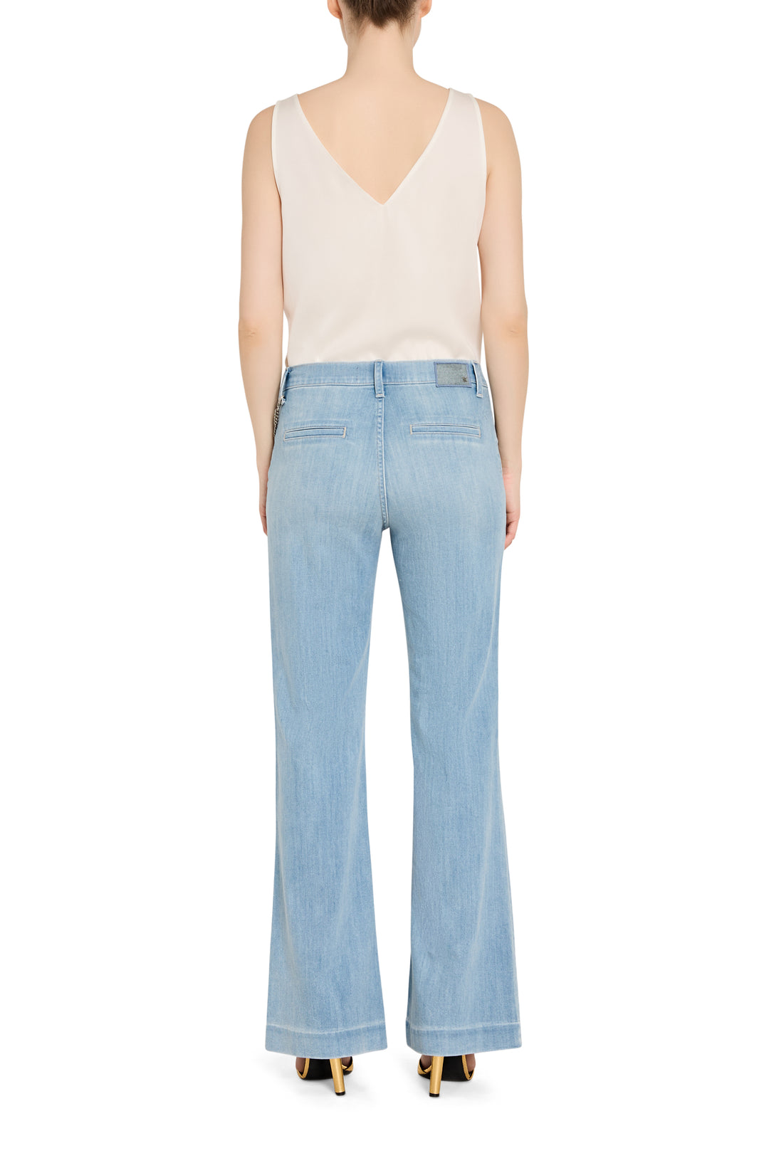 Wide-leg silhouette with classic trouser construction in sturdy denim. Back view on model.