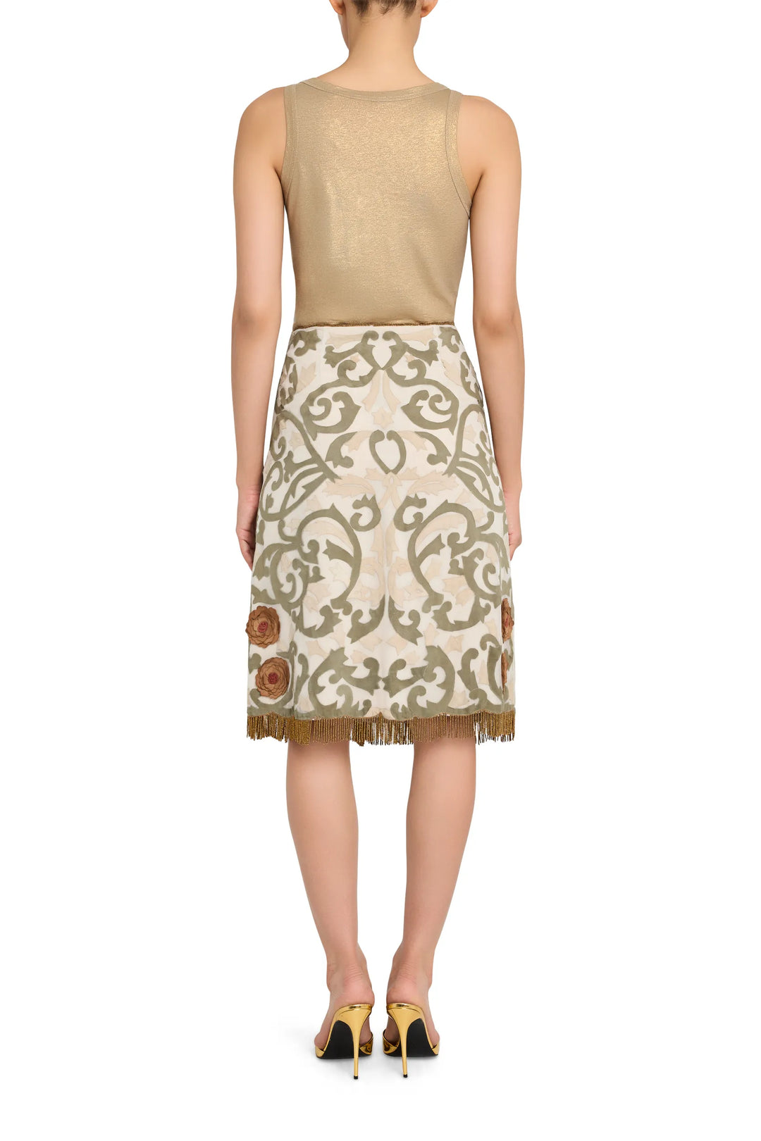 Organza midi skirt with appliqué and fringe trim, fluid silhouette, construction details visible, back view on model.