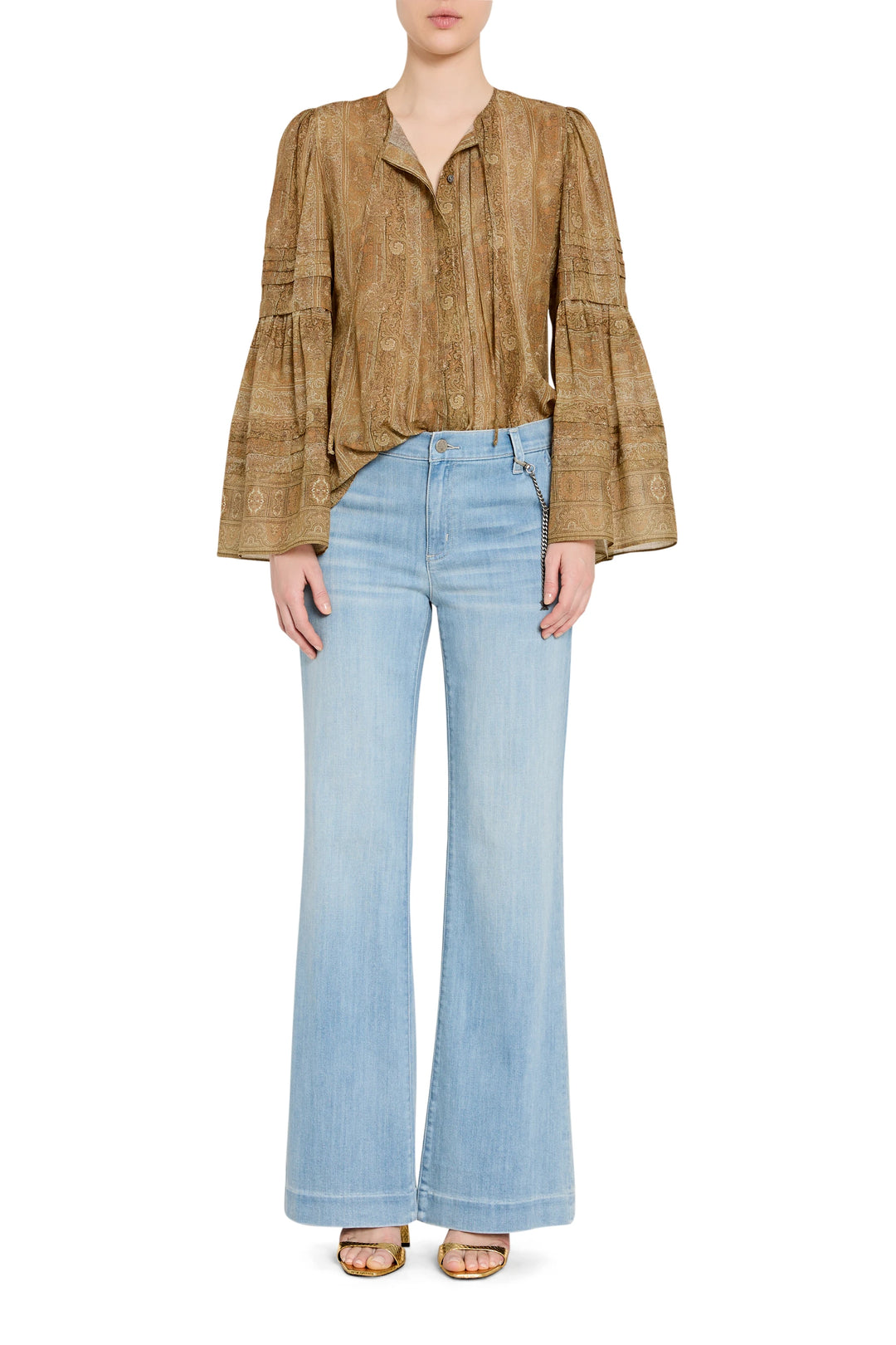 Relaxed-fit blouse with puff sleeves, button front, and soft gathers; lightweight woven fabric; front view on model.