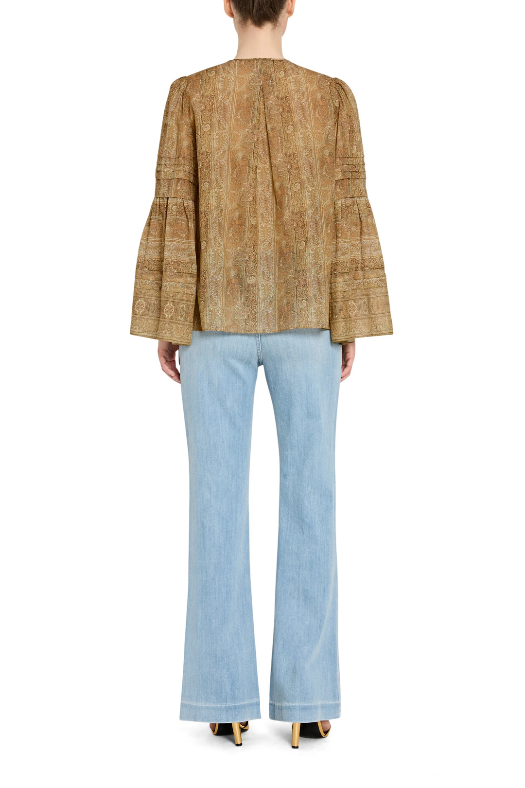 Relaxed-fit blouse with allover print, long sleeves, and back yoke. Back view on model.