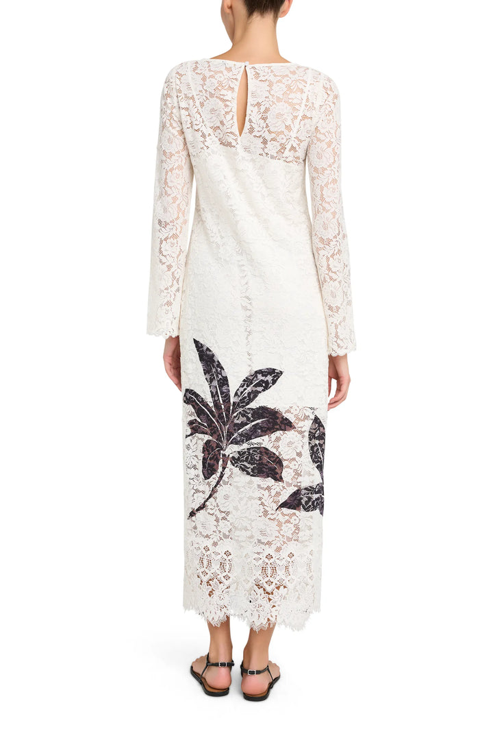 Maxi dress with lace overlay, botanical hem, fitted bodice and flowing skirt; back view on model.