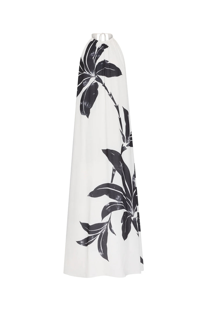 White dress with black floral pattern on a white background