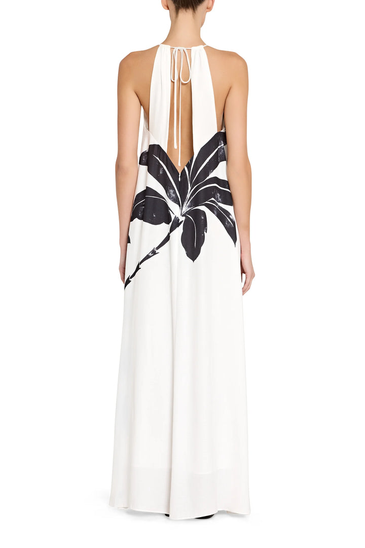 White dress with black leaf patterns on a white background
