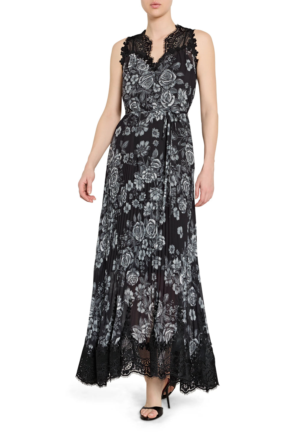 Black lace dress with floral patterns on a white background