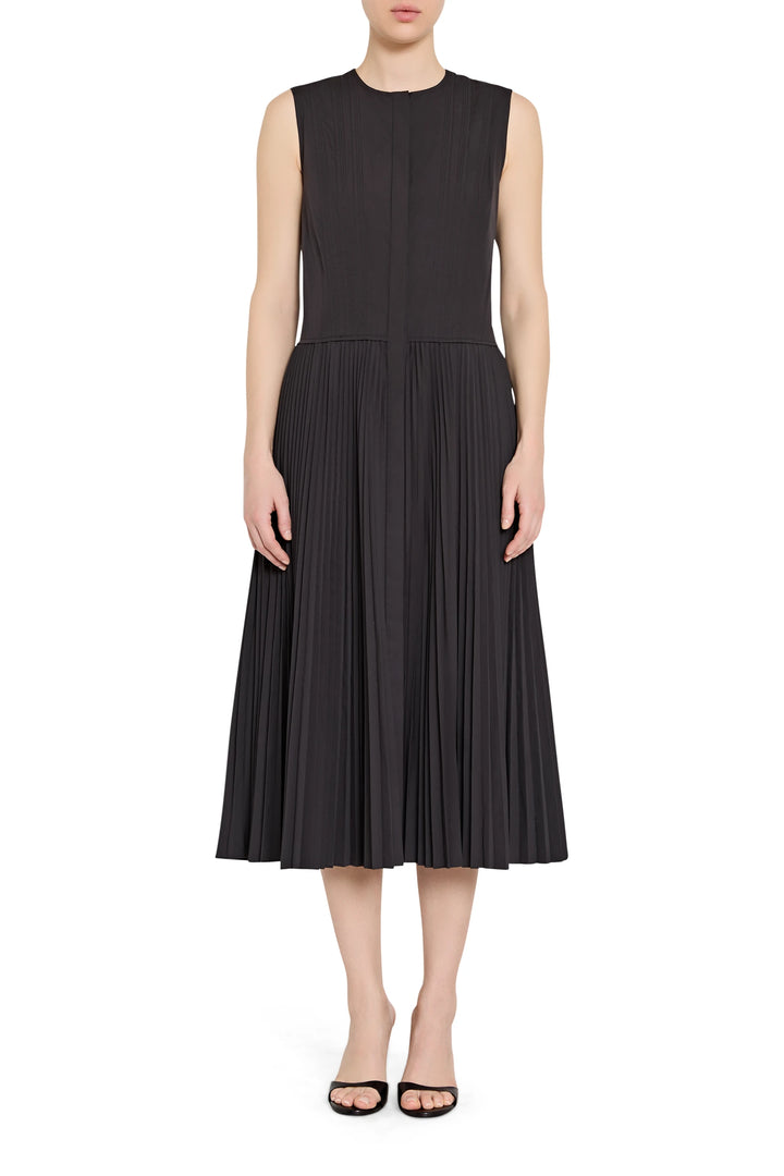Black sleeveless dress worn by a model on a white background