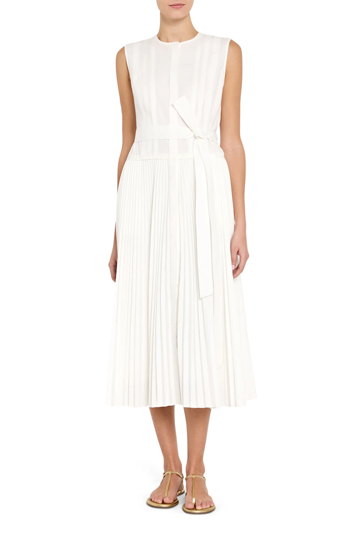 White sleeveless dress worn by a model on a white background