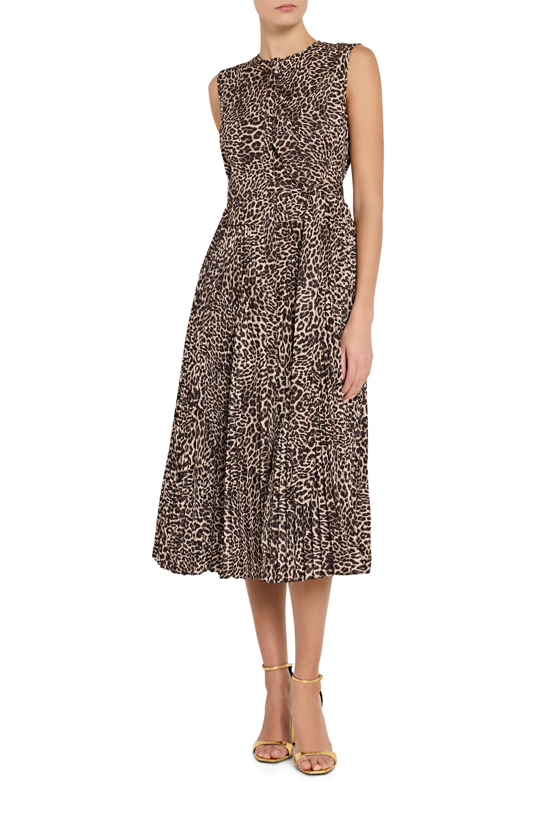Sleeveless, fitted-waist dress with animal print in lightweight fabric, midi silhouette; front view on model.