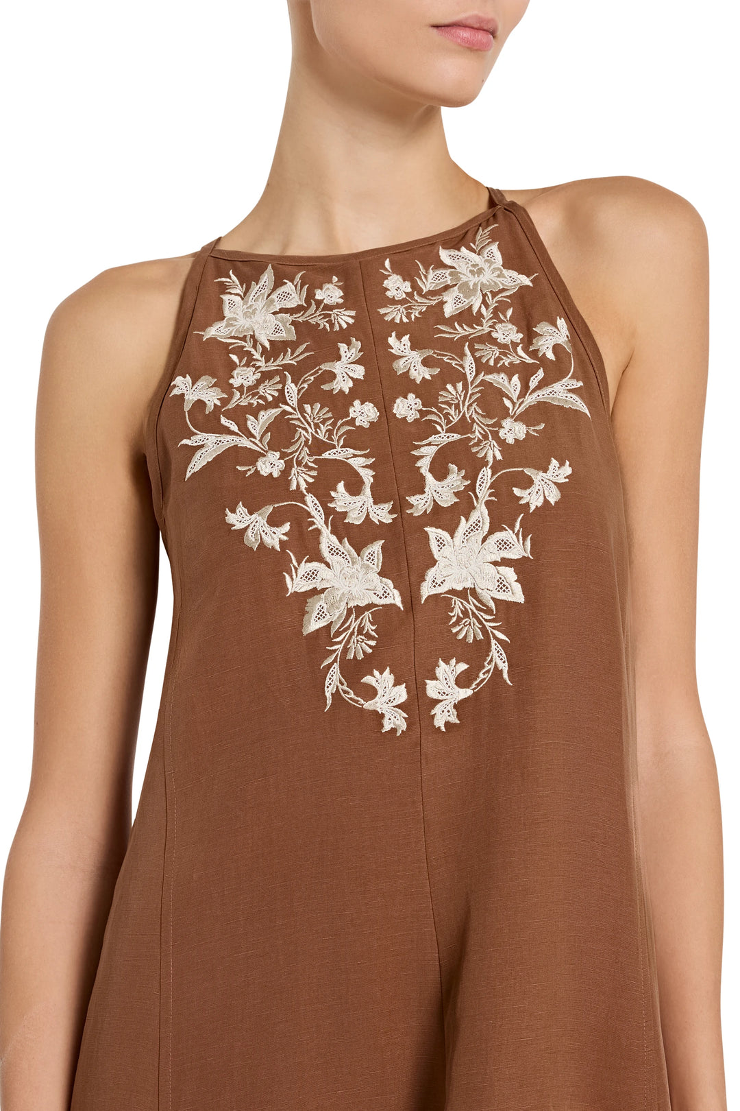Sleeveless A-line maxi dress with embroidered floral lace front panel, fitted bodice, front view on model.
