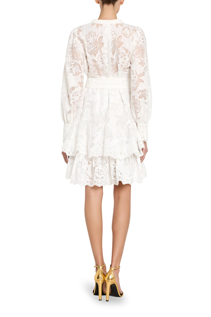 White lace dress with long sleeves on a white background