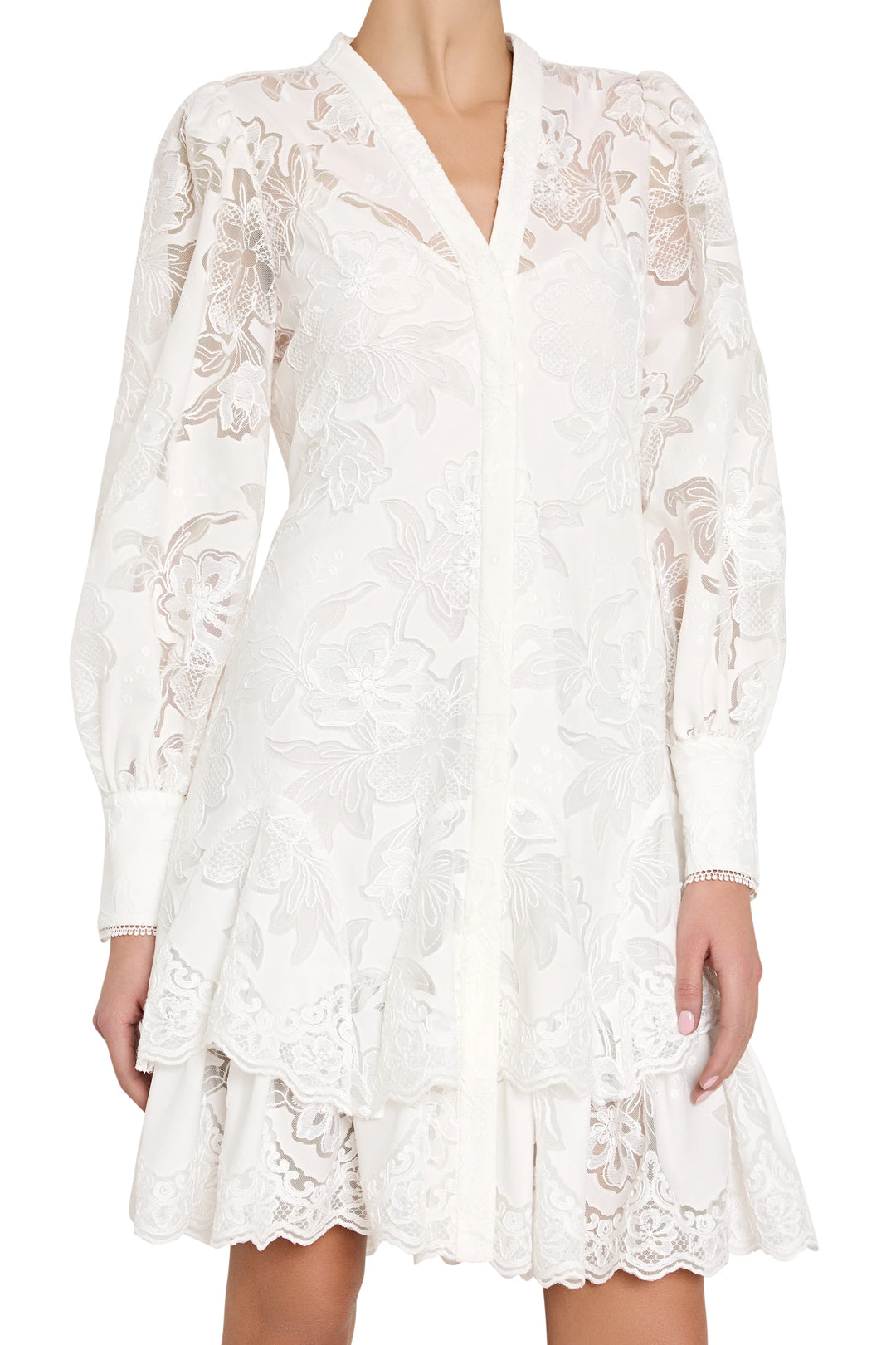 White lace dress with long sleeves on a white background